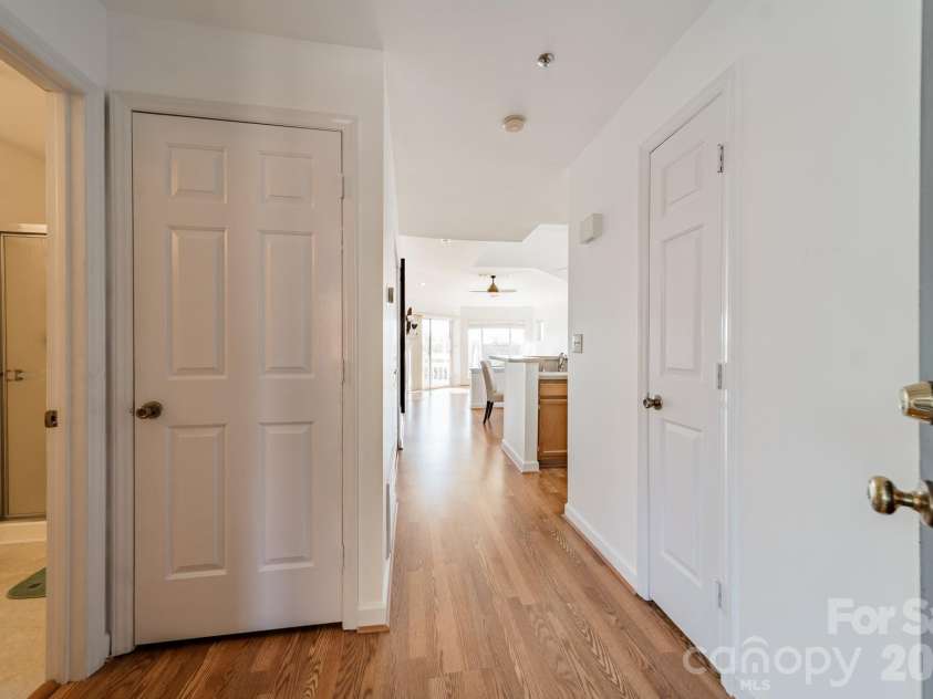 17919 Kings Point Drive, Cornelius, NC 28031.  MLS# CAR4320455, YatesRealty ID 11229. You will appreciate the natural light offered by this end unit from the moment you step inside.