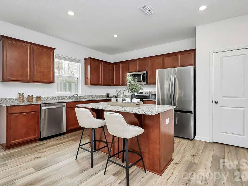 7013 Gale Force Lane, Charlotte, NC 28216.  MLS# CAR4347511, YatesRealty ID 11230. 