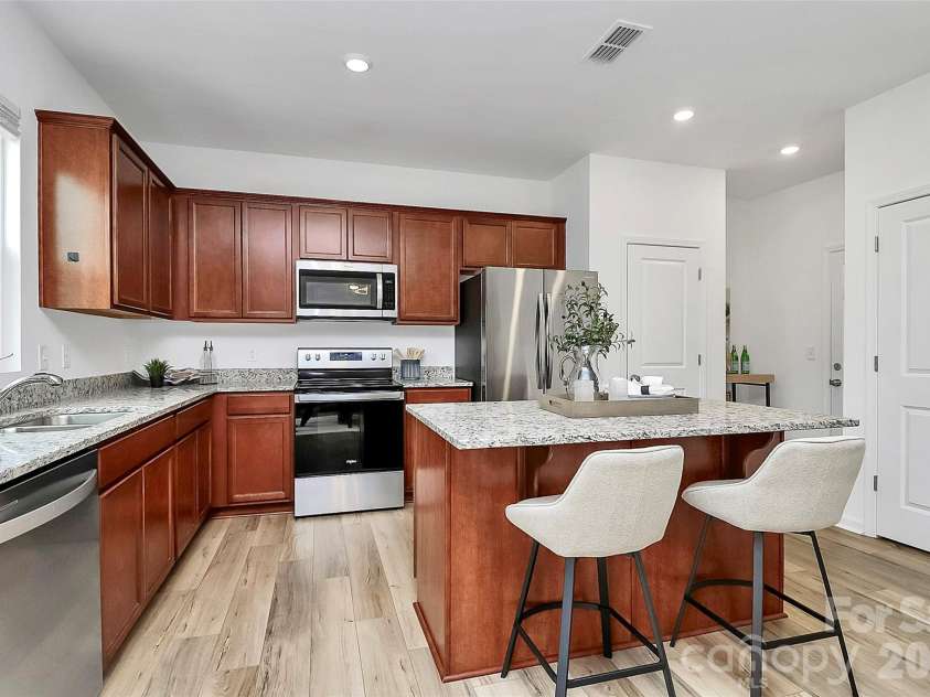 7013 Gale Force Lane, Charlotte, NC 28216.  MLS# CAR4347511, YatesRealty ID 11230. 