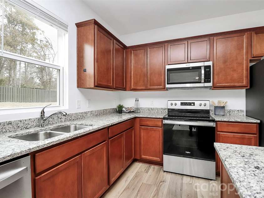 7013 Gale Force Lane, Charlotte, NC 28216.  MLS# CAR4347511, YatesRealty ID 11230. 