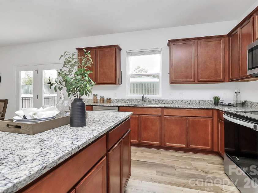 7013 Gale Force Lane, Charlotte, NC 28216.  MLS# CAR4347511, YatesRealty ID 11230. 