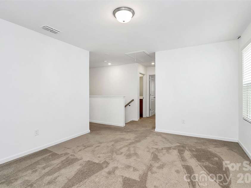 7013 Gale Force Lane, Charlotte, NC 28216.  MLS# CAR4347511, YatesRealty ID 11230. 