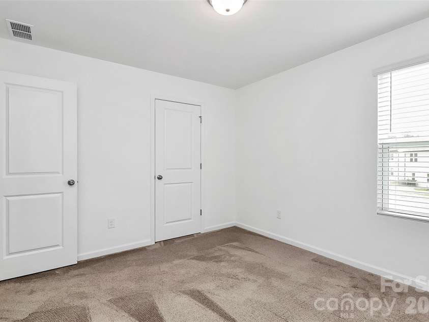 7013 Gale Force Lane, Charlotte, NC 28216.  MLS# CAR4347511, YatesRealty ID 11230. 