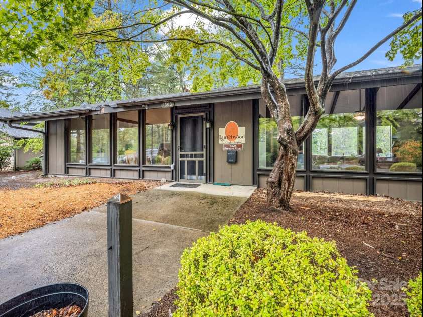 54 Laurelwood Circle, Hendersonville, NC 28791.  MLS# CAR4250430, YatesRealty ID 11231. Clubhouse, next to unit
