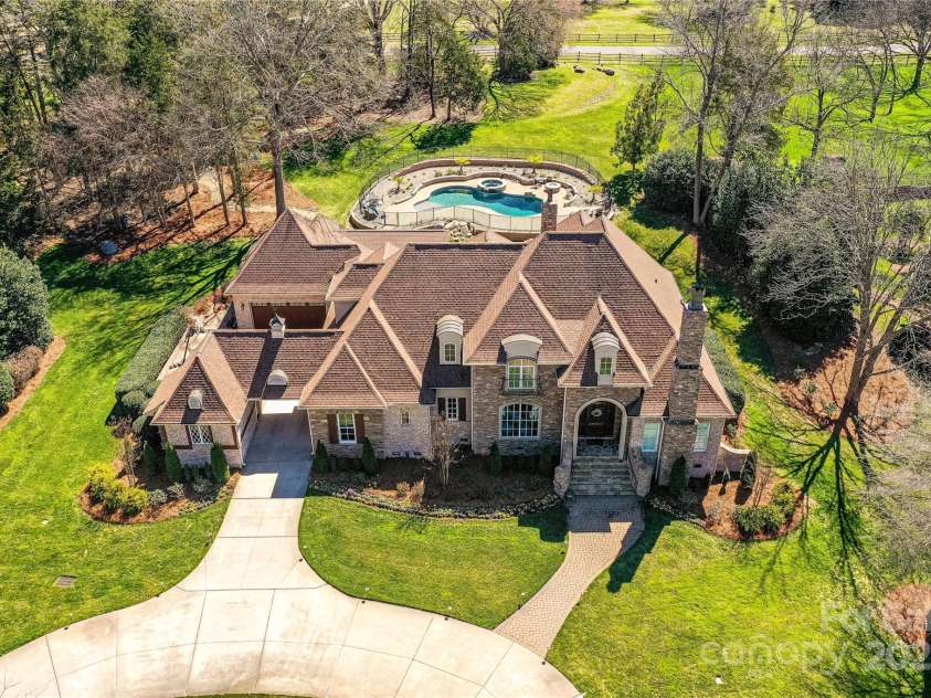 7295 Three Sisters Lane, Concord, NC 28027.  MLS# CAR4239485, YatesRealty ID 11233. Aerial View of Property located on 1.61 acres of incredibly beautiful land with mature landscaping & trees for privacy!