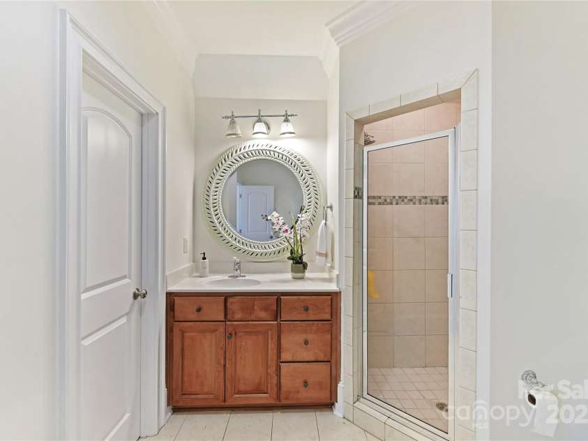 7295 Three Sisters Lane, Concord, NC 28027.  MLS# CAR4239485, YatesRealty ID 11233. Ensuite Bath with tiled shower & tile floors!
