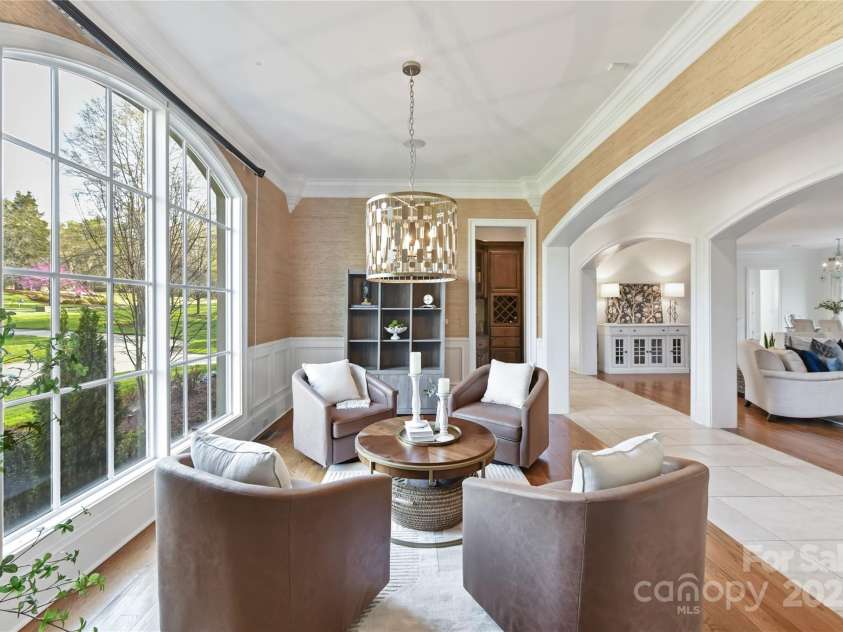 7295 Three Sisters Lane, Concord, NC 28027.  MLS# CAR4239485, YatesRealty ID 11233. Formal Dining Room/Flex Room with custom crown moldings & wainscoting!