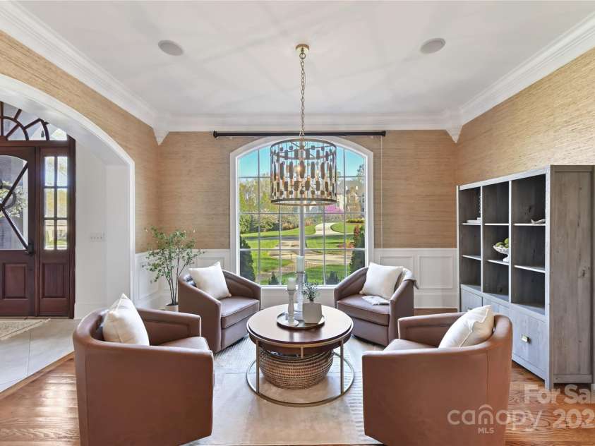 7295 Three Sisters Lane, Concord, NC 28027.  MLS# CAR4239485, YatesRealty ID 11233. Formal Dining Room/Flex Room with custom crown moldings & wainscoting!