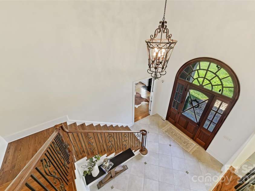 7295 Three Sisters Lane, Concord, NC 28027.  MLS# CAR4239485, YatesRealty ID 11233. Foyer View from upper level!