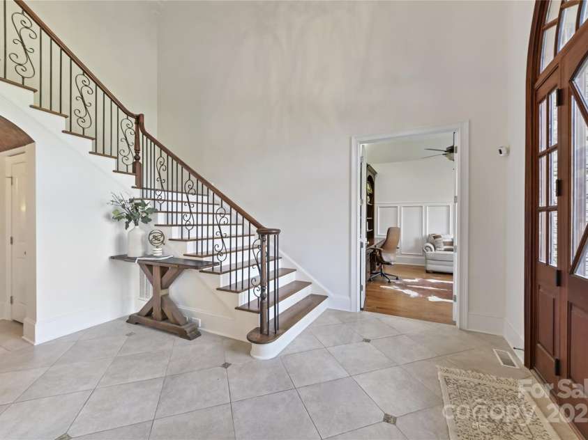 7295 Three Sisters Lane, Concord, NC 28027.  MLS# CAR4239485, YatesRealty ID 11233. Gorgeous 2 Story Foyer with Custom Front Door!