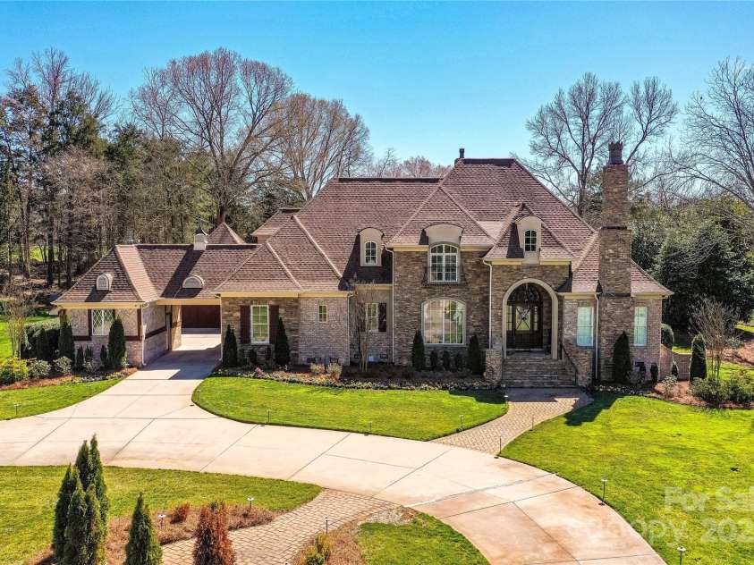 7295 Three Sisters Lane, Concord, NC 28027.  MLS# CAR4239485, YatesRealty ID 11233. Stunning, Exclusive, 5 Bedroom, 5 Bath, 2 Half Bath, Estate with Pool/Spa, beautifully situated on 1.6 acres in historic Jacob's Ridge community!