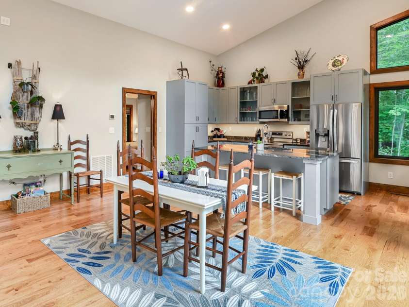 43 Tinkling Springs Lane, Fairview, NC 28730.  MLS# CAR4361581, YatesRealty ID 11237. Open Dining Area and Kitchen