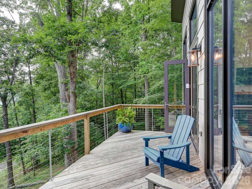 43 Tinkling Springs Lane, Fairview, NC 28730.  MLS# CAR4361581, YatesRealty ID 11237. Summer Deck View