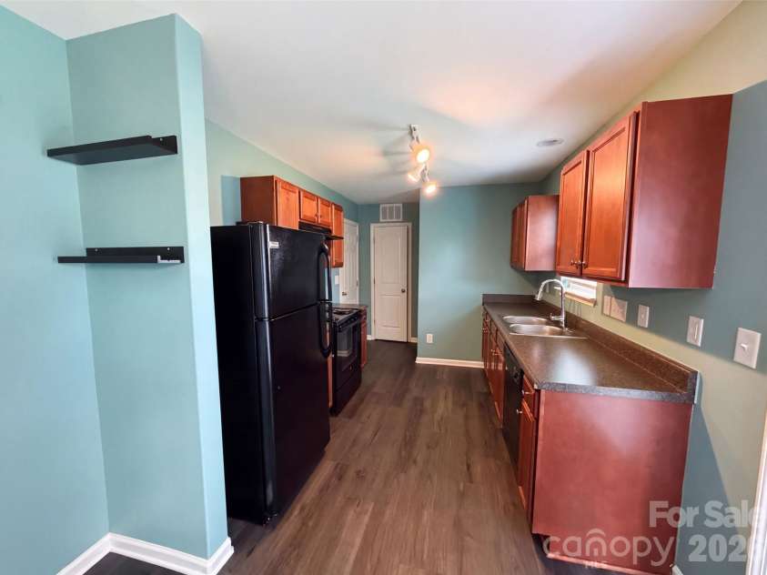 5730 Natick Drive, Charlotte, NC 28214.  MLS# CAR4413018, YatesRealty ID 11241. Staged Photo