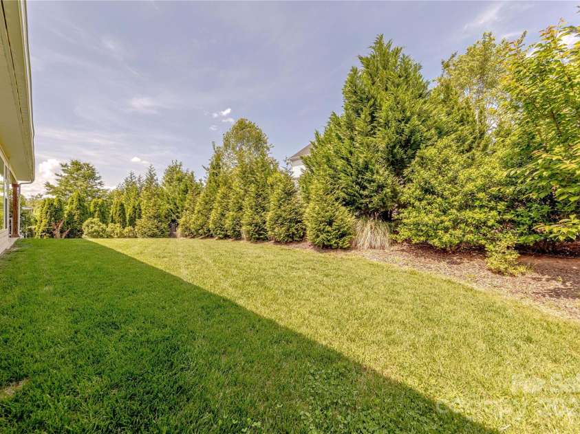 5128 Oakhaven Lane, Fort Mill, SC 29708.  MLS# CAR4253381, YatesRealty ID 11248. Privacy Landscaped Backyard