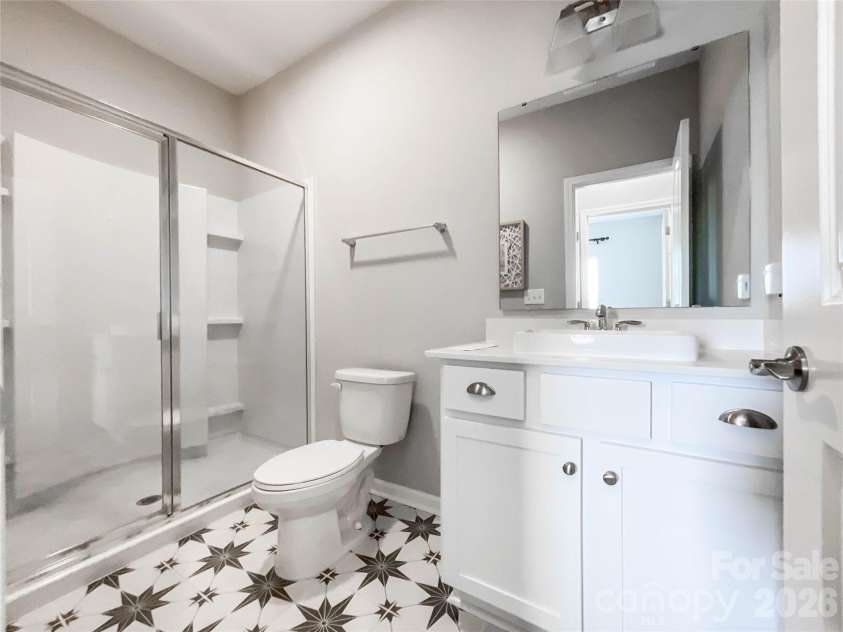 21228 Sanctuary Drive, Lancaster, SC 29720.  MLS# CAR4364757, YatesRealty ID 11249. 2nd main level bath with upgraded floor tile