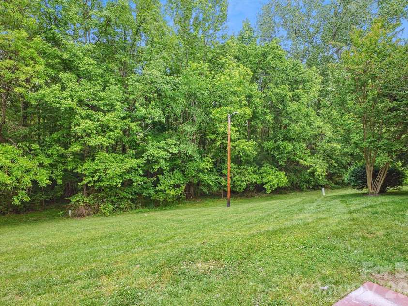 8322 Summerglen Circle, Charlotte, NC 28227.  MLS# CAR4329058, YatesRealty ID 11250. Backyard