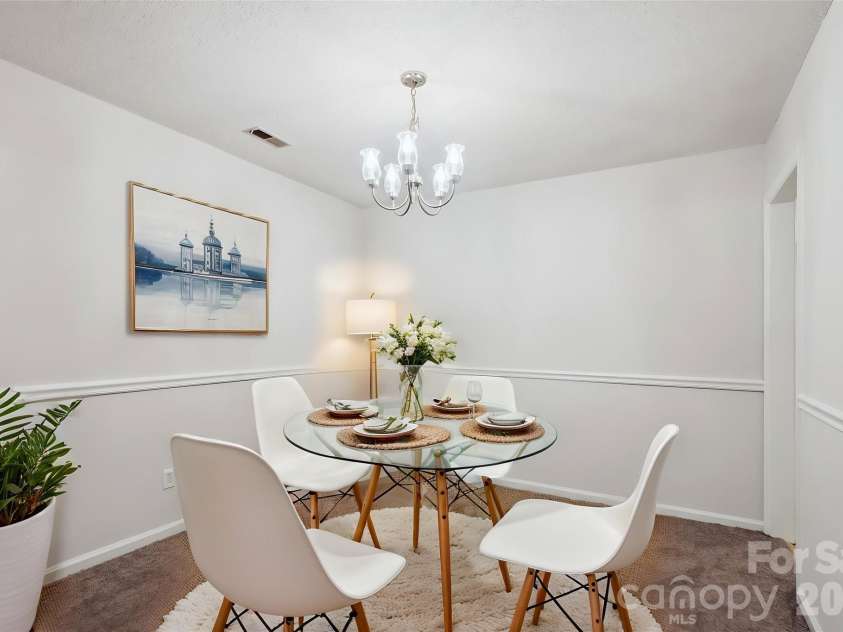 8322 Summerglen Circle, Charlotte, NC 28227.  MLS# CAR4329058, YatesRealty ID 11250. Virtually Staged Dining