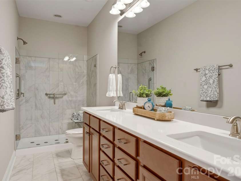 11723 Meetinghouse Drive, Cornelius, NC 28031.  MLS# CAR4359407, YatesRealty ID 11252. Updated flrs, counters, shower w/bars & seat