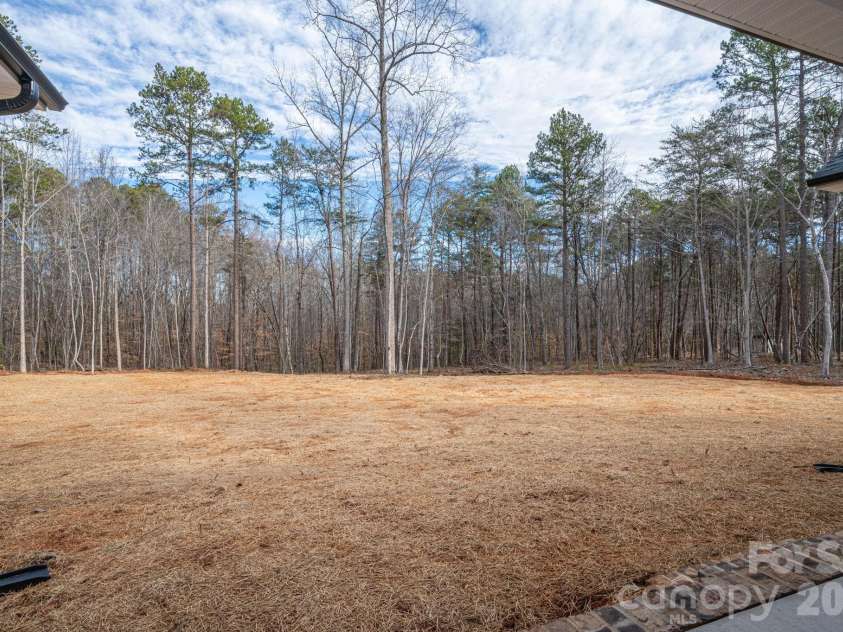 6335 Forney Hill Road, Denver, NC 28037.  MLS# CAR4346554, YatesRealty ID 11253. Huge back yard ready for your special touch