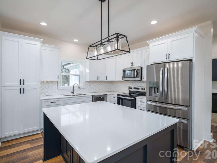 6335 Forney Hill Road, Denver, NC 28037.  MLS# CAR4346554, YatesRealty ID 11253. Island accommodates barstools