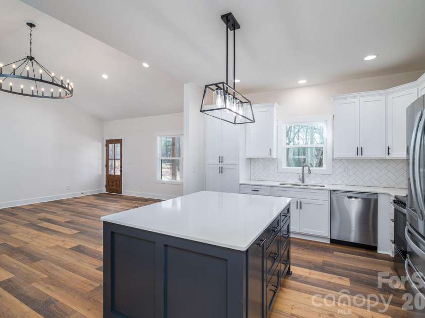 6335 Forney Hill Road, Denver, NC 28037.  MLS# CAR4346554, YatesRealty ID 11253. Kitchen looking towards living room