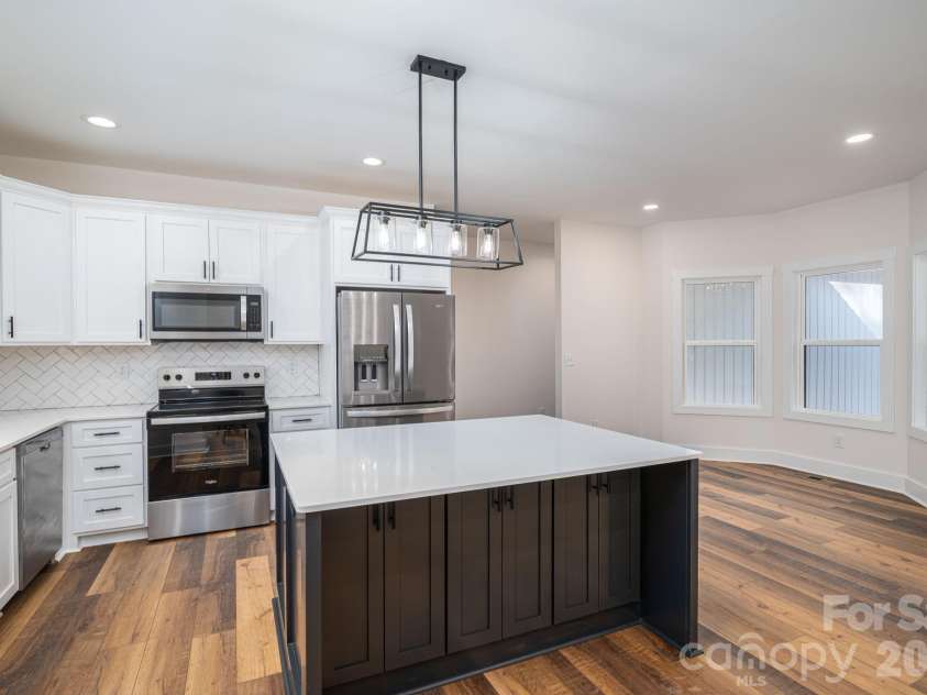 6335 Forney Hill Road, Denver, NC 28037.  MLS# CAR4346554, YatesRealty ID 11253. Kitchen with breakfast nook on right