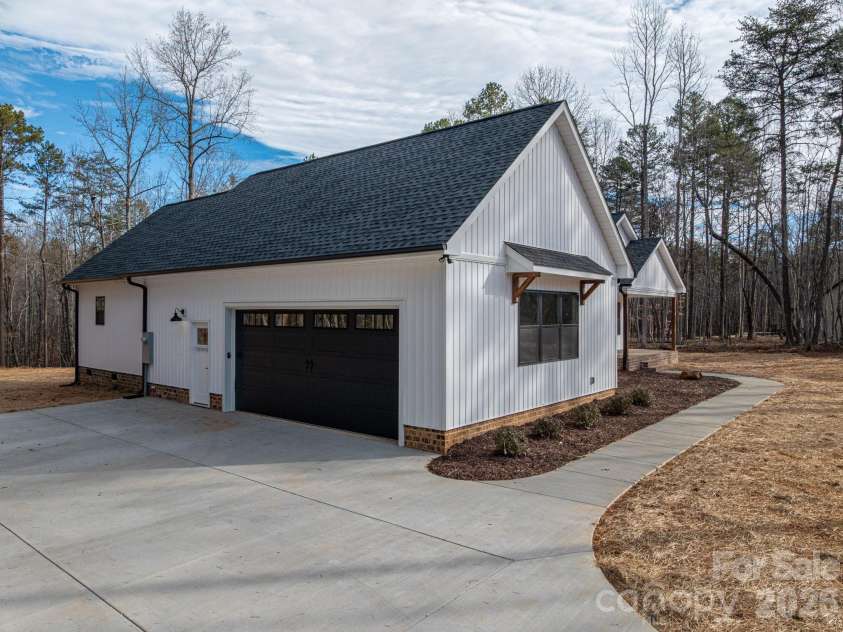 6335 Forney Hill Road, Denver, NC 28037.  MLS# CAR4346554, YatesRealty ID 11253. Side entrance garage