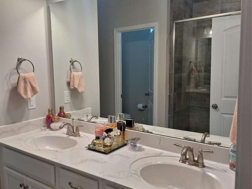 1202 Calder Drive, Indian Trail, NC 28079.  MLS# CAR4250682, YatesRealty ID 11254. Dual Sinks Primary bedroom