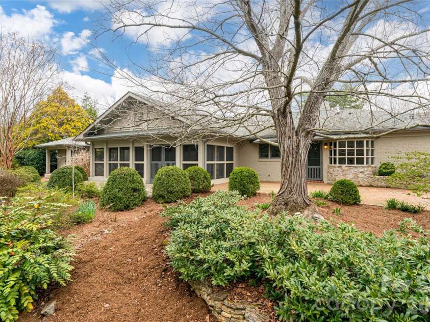 21 Pine Tree Circle, Asheville, NC 28804.  MLS# CAR4344611, YatesRealty ID 11264. Beautifully landscaped