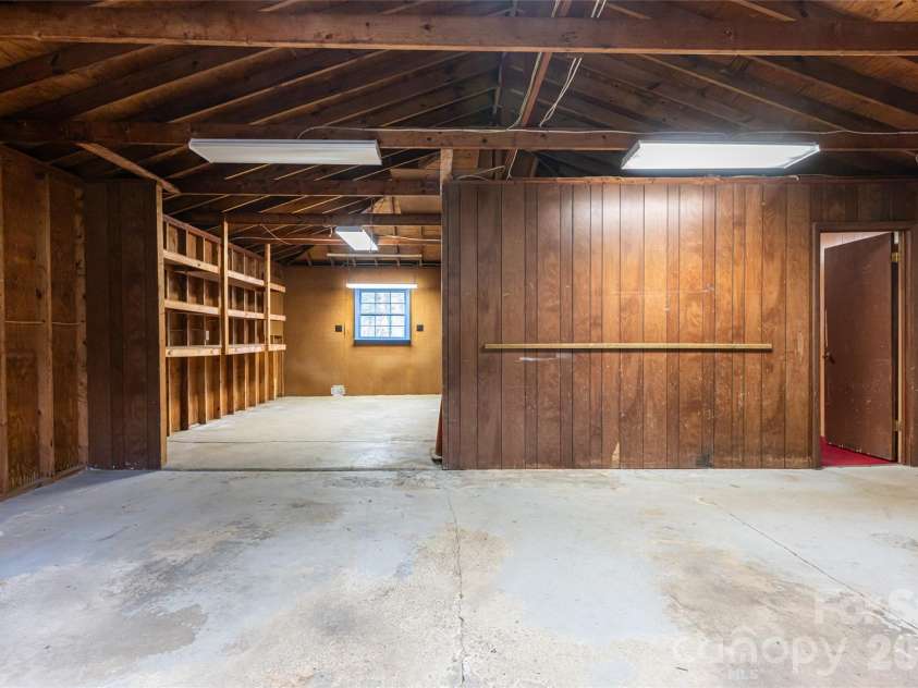 21 Pine Tree Circle, Asheville, NC 28804.  MLS# CAR4344611, YatesRealty ID 11264. Garage storage