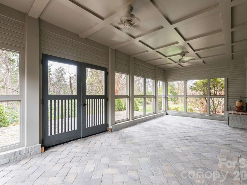 21 Pine Tree Circle, Asheville, NC 28804.  MLS# CAR4344611, YatesRealty ID 11264. Screened porch