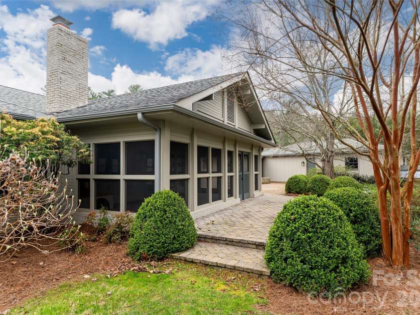 21 Pine Tree Circle, Asheville, NC 28804.  MLS# CAR4344611, YatesRealty ID 11264. Screened porch
