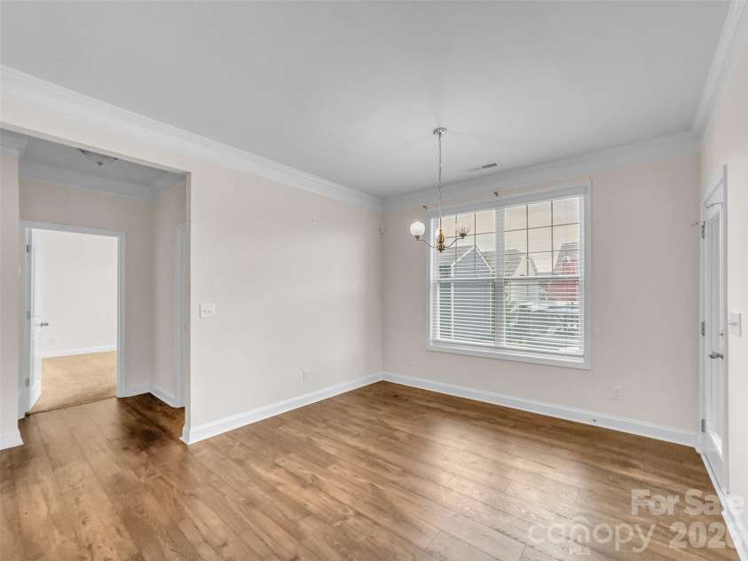 2045 Saddlebred Drive, Iron Station, NC 28080.  MLS# CAR4433684, YatesRealty ID 1127. Dining area from the kitchen