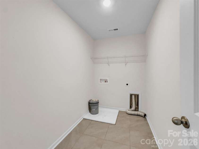 2045 Saddlebred Drive, Iron Station, NC 28080.  MLS# CAR4433684, YatesRealty ID 1127. Laundry room