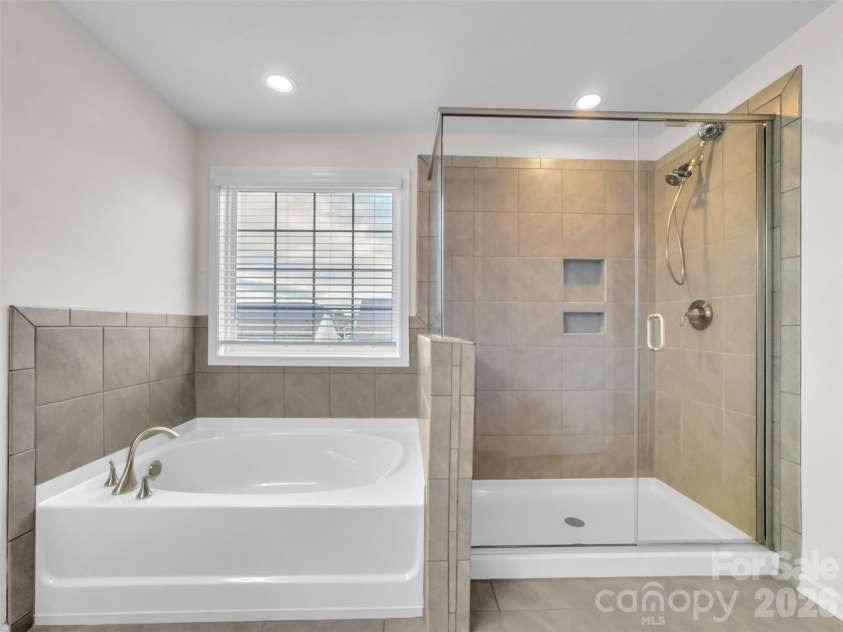2045 Saddlebred Drive, Iron Station, NC 28080.  MLS# CAR4433684, YatesRealty ID 1127. Master bath