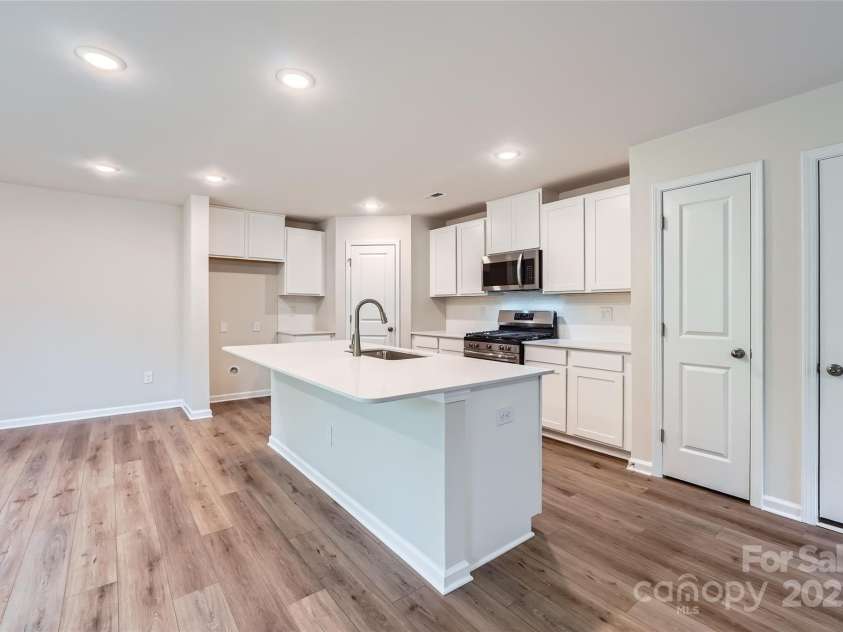 126 Dorian Place, Troutman, NC 28166.  MLS# CAR4256381, YatesRealty ID 11271. Kitchen