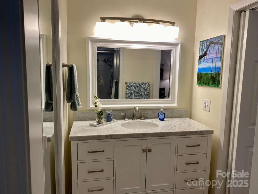 118 Lake Drive, Lake Lure, NC 28746.  MLS# CAR4254226, YatesRealty ID 11276. Elegant vaniity