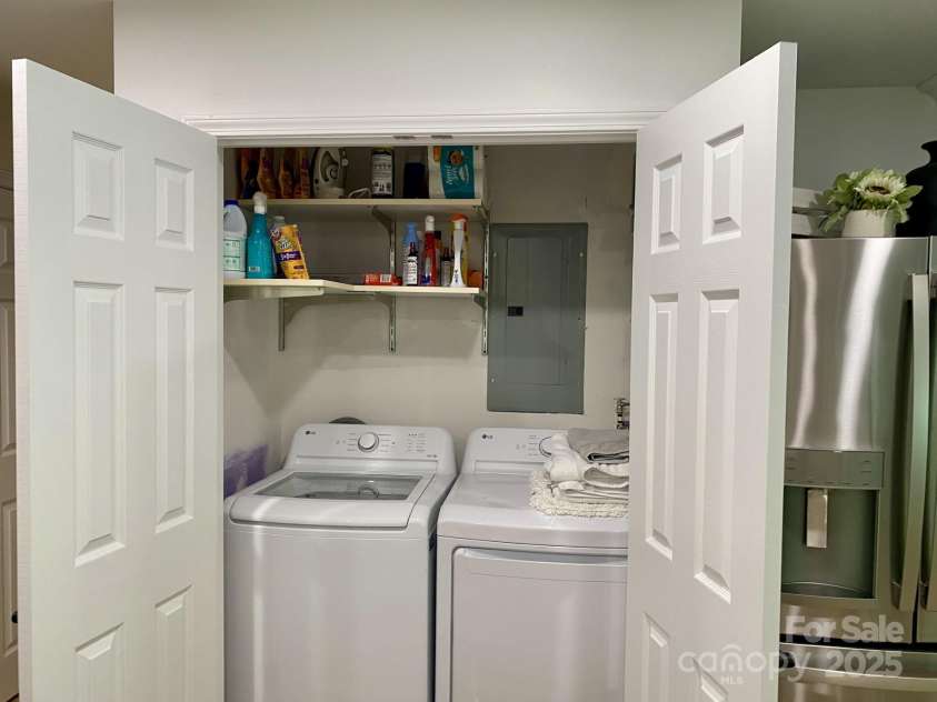 118 Lake Drive, Lake Lure, NC 28746.  MLS# CAR4254226, YatesRealty ID 11276. Full size washer and dryer included and tankless water heater