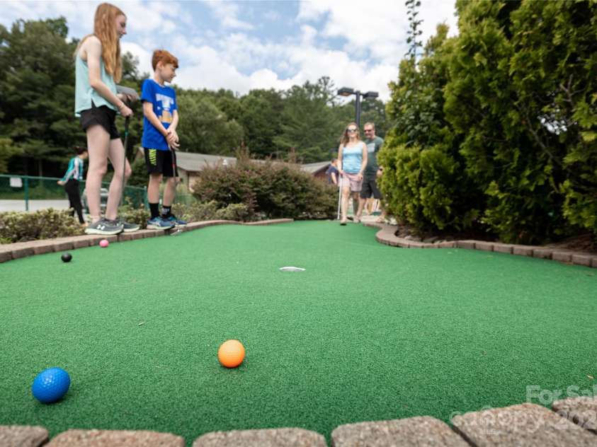 118 Lake Drive, Lake Lure, NC 28746.  MLS# CAR4254226, YatesRealty ID 11276. Mini golf