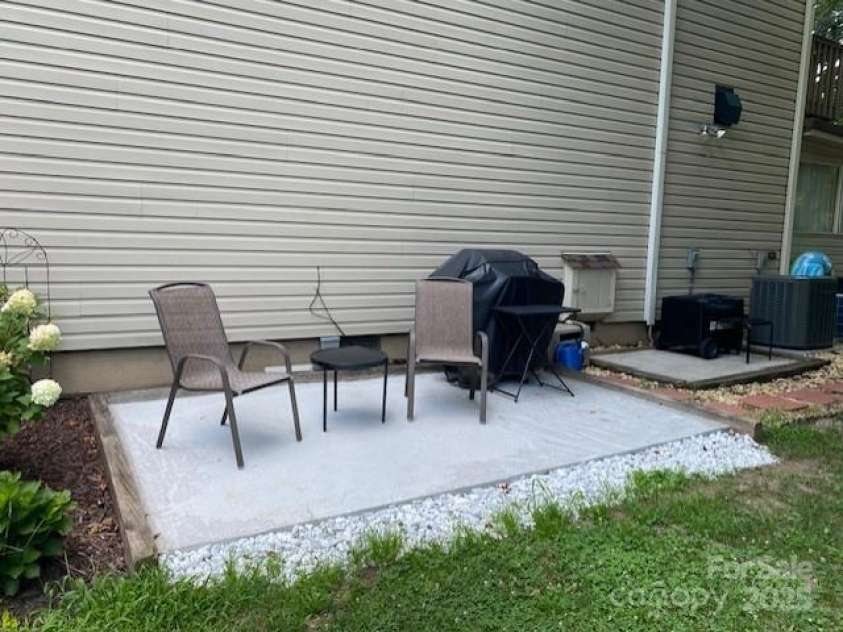 118 Lake Drive, Lake Lure, NC 28746.  MLS# CAR4254226, YatesRealty ID 11276. Side porch of house, great for grilling