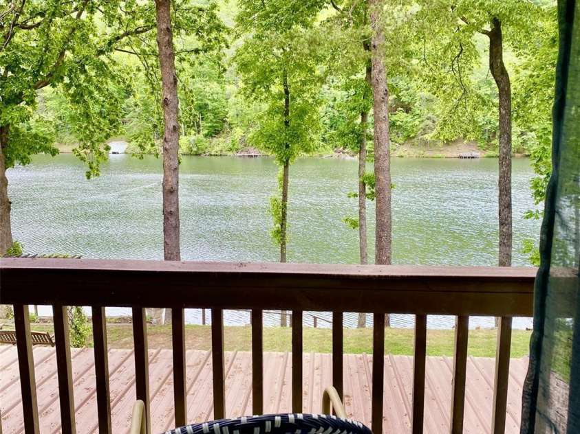 118 Lake Drive, Lake Lure, NC 28746.  MLS# CAR4254226, YatesRealty ID 11276. View off deck to upstairs bedroom