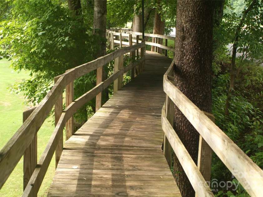 118 Lake Drive, Lake Lure, NC 28746.  MLS# CAR4254226, YatesRealty ID 11276. Walking trails