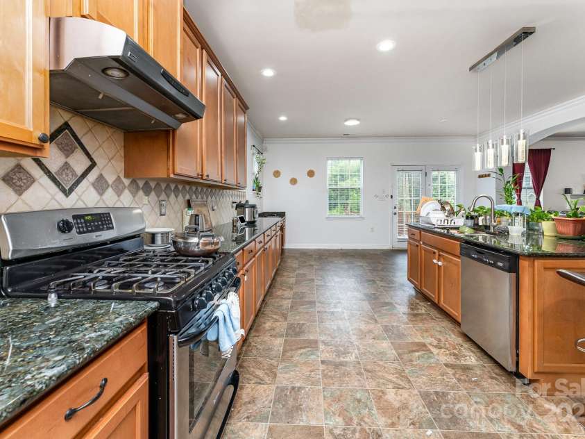 1105 BOTTLE BRUSH Lane, Harrisburg, NC 28075.  MLS# CAR4256457, YatesRealty ID 11277. 