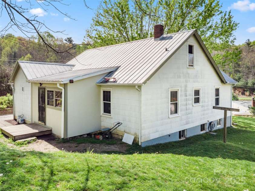 377 Cabin Road, Spruce Pine, NC 28777.  MLS# CAR4256421, YatesRealty ID 11280. Back entry deck