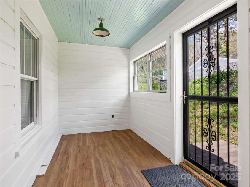 377 Cabin Road, Spruce Pine, NC 28777.  MLS# CAR4256421, YatesRealty ID 11280. Enclosed entry porch