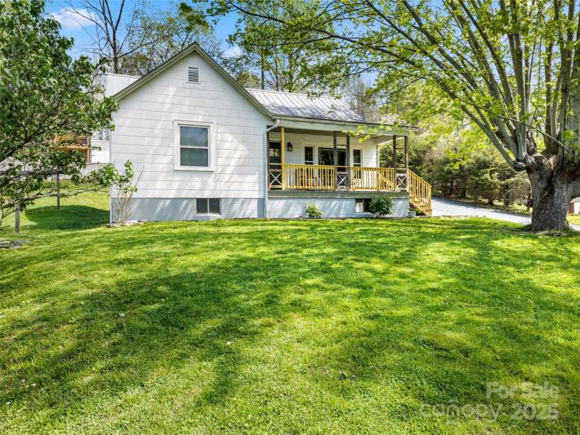 377 Cabin Road, Spruce Pine, NC 28777.  MLS# CAR4256421, YatesRealty ID 11280. Front yard