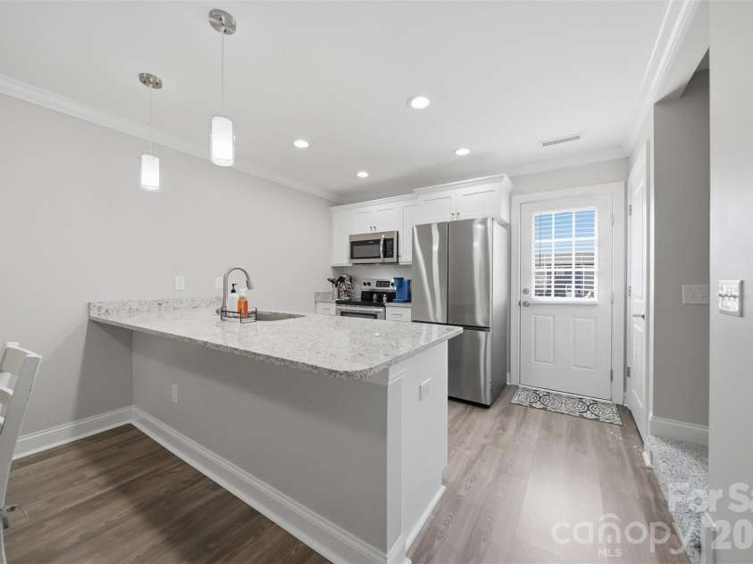 3953 Newhall Drive, Hickory, NC 28601.  MLS# CAR4369343, YatesRealty ID 11283. Open Concept Kitchen/Back Entry View