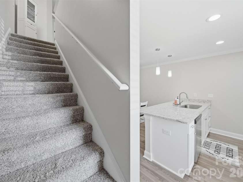 3953 Newhall Drive, Hickory, NC 28601.  MLS# CAR4369343, YatesRealty ID 11283. Stairway/Kitchen View
