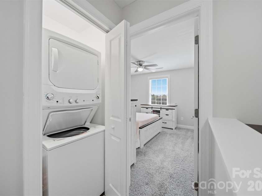 3953 Newhall Drive, Hickory, NC 28601.  MLS# CAR4369343, YatesRealty ID 11283. Upper-Level Laundry Closet View (Washer & Dryer Convey)